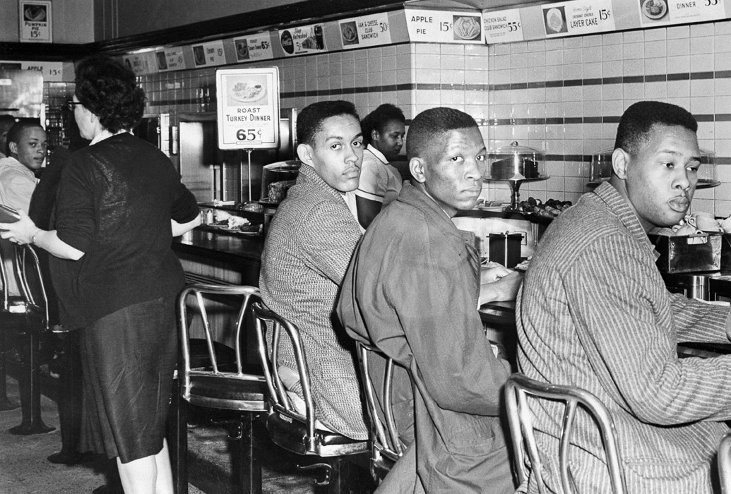 Figure 6-2: A sit-in at an all-white lunch counter.